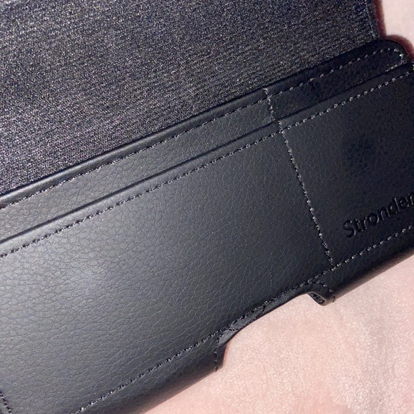 Stronden Black Phone Case. Never used
Fits iPhone 11. 2 pockets inside. - Picture 8 of 9